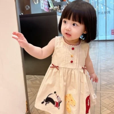 junior Kominz Baby Girl Dress – Sleeveless Cotton with Embroidery and Teddy Charm.